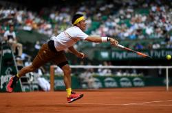 爱游戏-法网横扫澳网，蒂姆点燃赛场